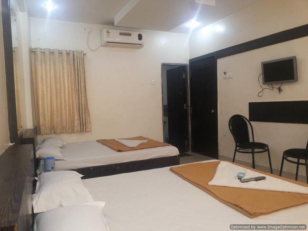 Hotel Sai Galaxy Inn Shirdi Værelse billede